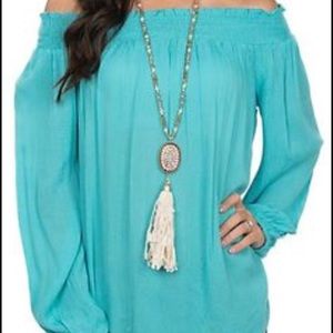 Light Blue off the shoulder shirt